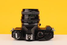 Load image into Gallery viewer, Miranda MS-1 Super 35mm SLR Film Camera with Sigma 28mm f/2.8 Lens
