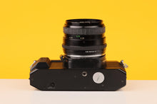 Load image into Gallery viewer, Miranda MS-1 Super 35mm SLR Film Camera with Sigma 28mm f/2.8 Lens
