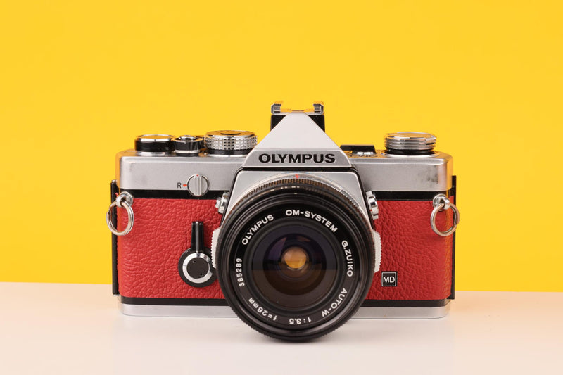 Olympus OM-1 35mm Film Camera with Olympus 28mm f/2.8 Prime Lens in Red