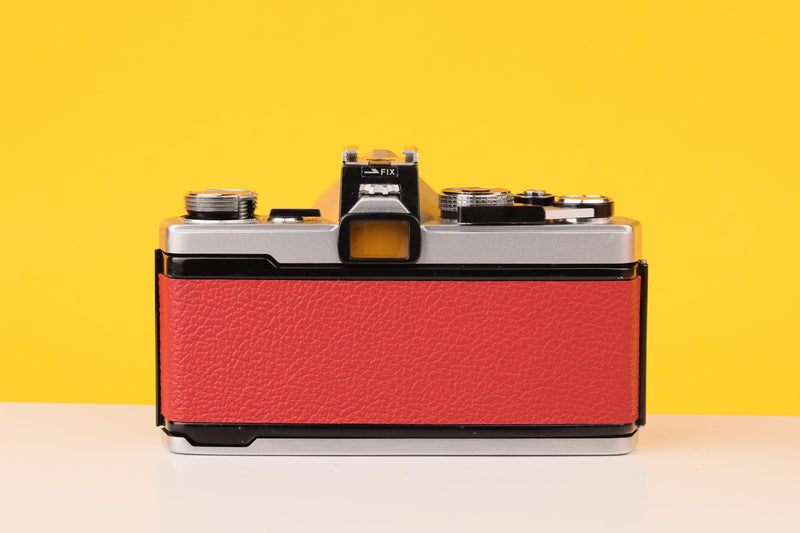 Olympus OM-1 35mm Film Camera with Olympus 28mm f/2.8 Prime Lens in Red