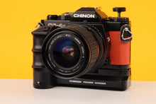 Load image into Gallery viewer, Chinon CM-4s 35mm Point and Shoot Film Camera with Sigma 28-70mm f3.5-4.5 Zoom Lens
