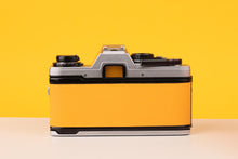 Load image into Gallery viewer, Olympus OM10 35mm SLR Film Camera with Olympus Zuiko 28mm f/2.8 Lens
