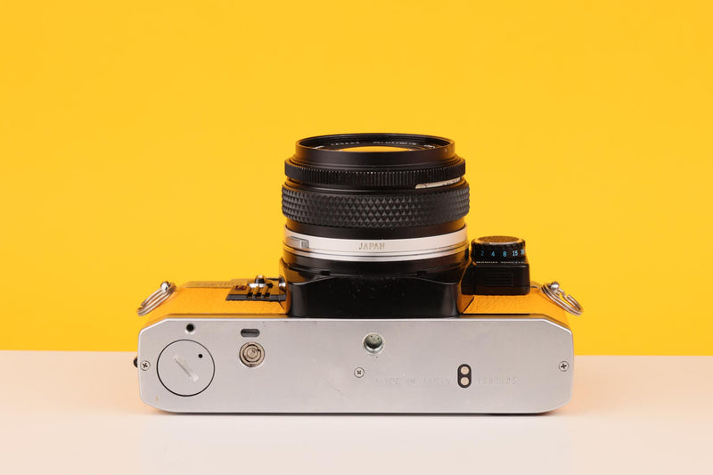 Olympus OM10 35mm SLR Film Camera with Olympus Zuiko 28mm f/2.8 Lens and Manual Adapter