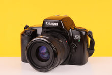 Load image into Gallery viewer, Canon EOS 1000Fn 35mm SLR Film Camera with Canon 35-70mm Lens
