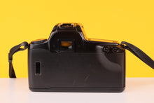 Load image into Gallery viewer, Canon EOS 1000Fn 35mm SLR Film Camera with Canon 35-70mm Lens
