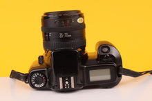 Load image into Gallery viewer, Canon EOS 1000Fn 35mm SLR Film Camera with Canon 35-70mm Lens
