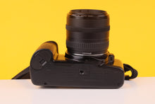 Load image into Gallery viewer, Canon EOS 1000Fn 35mm SLR Film Camera with Canon 35-70mm Lens
