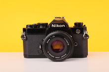 Load image into Gallery viewer, Nikon FM Black 35mm Film Camera with Nikon Nikkor 50mm f/1.8 Lens
