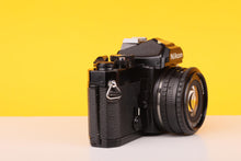 Load image into Gallery viewer, Nikon FM Black 35mm Film Camera with Nikon Nikkor 50mm f/1.8 Lens
