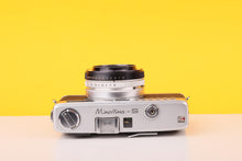 Load image into Gallery viewer, Minolta Minoltina-S 35mm Rangefinder Film Camera with Case
