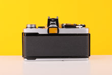 Load image into Gallery viewer, Olympus OM-1n 35mm SLR Film Camera with Zuiko 50mm f1.8 Lens
