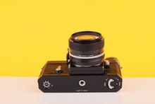 Load image into Gallery viewer, Nikon F Photomic 35mm SLR Film Camera with Nikon Nikkor 28mm f3.5
