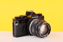 Load image into Gallery viewer, Olympus OM-1n MD Black 35mm Film Camera with Zuiko 100mm f/2.8 Lens
