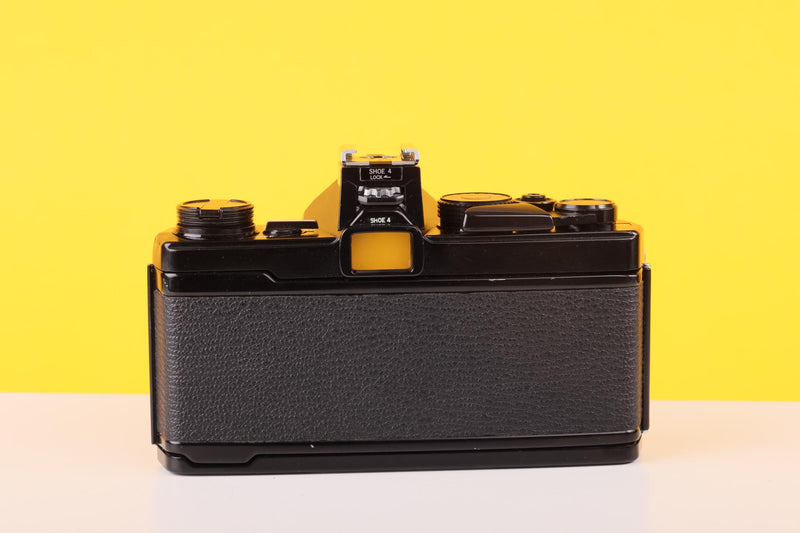 Olympus OM-1n MD Black 35mm Film Camera with Zuiko 100mm f/2.8 Lens
