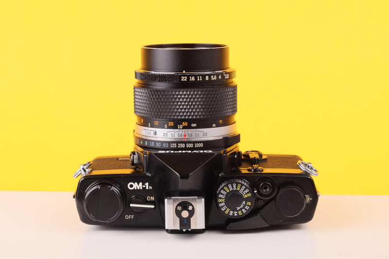 Olympus OM-1n MD Black 35mm Film Camera with Zuiko 100mm f/2.8 Lens