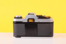 Load image into Gallery viewer, Olympus OM20 35mm SLR Film Camera with Zuiko 35-70mm f/3.5 Lens
