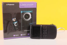 Load image into Gallery viewer, Polaroid digital camcorder with packaging on a yellow background
