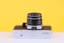 Load image into Gallery viewer, Praktica Super TL3 35mm SLR Film Camera with Domiplan 50mm f/2.8 Lens
