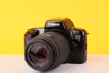 Load image into Gallery viewer, Canon EOS 1000Fn 35mm SLR Film Camera with Sigma 70-210mm Lens
