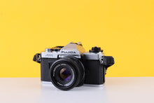 Load image into Gallery viewer, Fujica AX-1 35mm SLR Film Camera with X-Fujinon 55mm F/2.2 Lens
