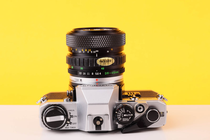 Olympus OM10 35mm SLR Film Camera with Olympus OM-System S Zuiko Auto-Zoom 28-48mm f4 Lens