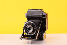 Load image into Gallery viewer, Welta Weltur 120 Folding Medium Format Film Camera with Xenar 7.5cm f/2.8 Lens
