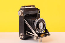 Load image into Gallery viewer, Welta Weltur 120 Folding Medium Format Film Camera with Xenar 7.5cm f/2.8 Lens
