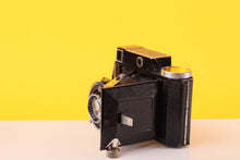 Load image into Gallery viewer, Welta Weltur 120 Folding Medium Format Film Camera with Xenar 7.5cm f/2.8 Lens
