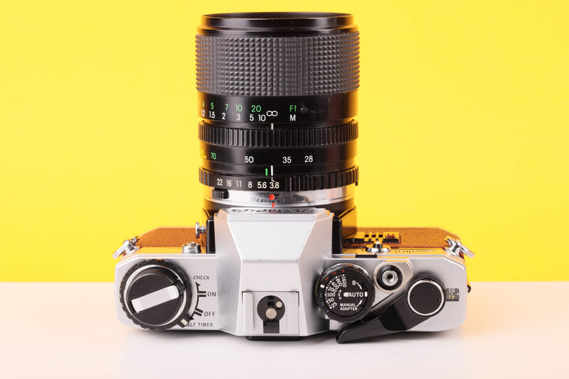 Olympus OM10 35mm SLR Film Camera with Miranda 28-70mm f3.5-4.5 MC Macro Lens Burgundy