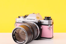 Load image into Gallery viewer, Olympus OM10 35mm SLR Film Camera and Olympus Zuiko Auto-T 135mm f3.5 Lens

