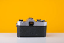 Load image into Gallery viewer, Yashica TL Electro 35mm SLR Film Camera with a Carl Zeiss MC 135mm f3.5 Lens
