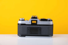 Load image into Gallery viewer, Canon AE-1 35mm SLR Film Camera with 50mm f1.8 lens
