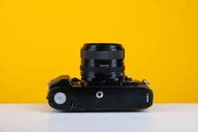 Load image into Gallery viewer, Canon A-1 Vintage SLR 35mm Film Camera with Canon FD 28mm f/2.8 Lens
