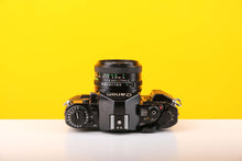 Load image into Gallery viewer, Canon A-1 35mm SLR Film Camera with Canon FD 50mm f1.8 Lens
