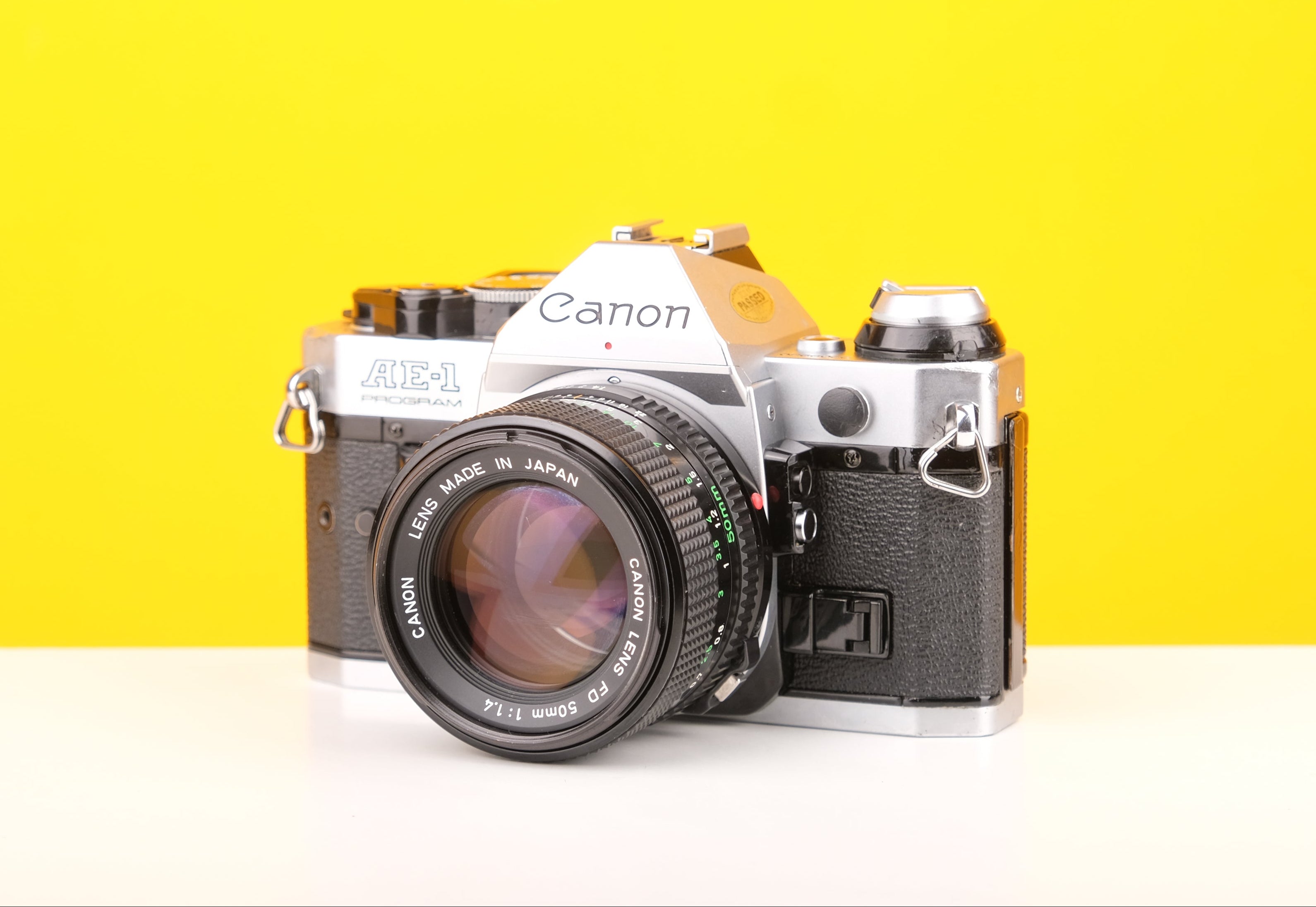 Canon AE-1 Program 35mm SLR Film Camera with Canon 50mm f1.4 FD