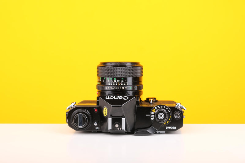 Canon EF 35mm SLR Film Camera with Canon FD 50mm f1.4 Lens
