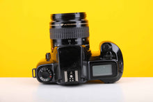 Load image into Gallery viewer, Canon EOS 1000F 35mm Film Camera with Canon 35-105mm f4.5-5.6 Zoom Lens

