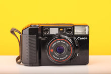 Load image into Gallery viewer, Canon Sure Shot 35mm Point and Shoot Film Camera
