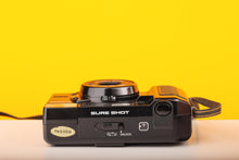Load image into Gallery viewer, Canon Sure Shot 35mm Point and Shoot Film Camera
