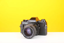 Load image into Gallery viewer, Centon DF-300 35mm SLR Film Camera with Miranda 35-70mm f3.5-4.5 MC Macro Lens
