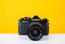 Load image into Gallery viewer, Chinon CM-4s 35mm Point and Shoot Film Camera with Sigma 28-70mm f3.5-4.5 Zoom Lens
