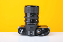 Load image into Gallery viewer, Chinon CM-4s 35mm Point and Shoot Film Camera with Sigma 28-70mm f3.5-4.5 Zoom Lens
