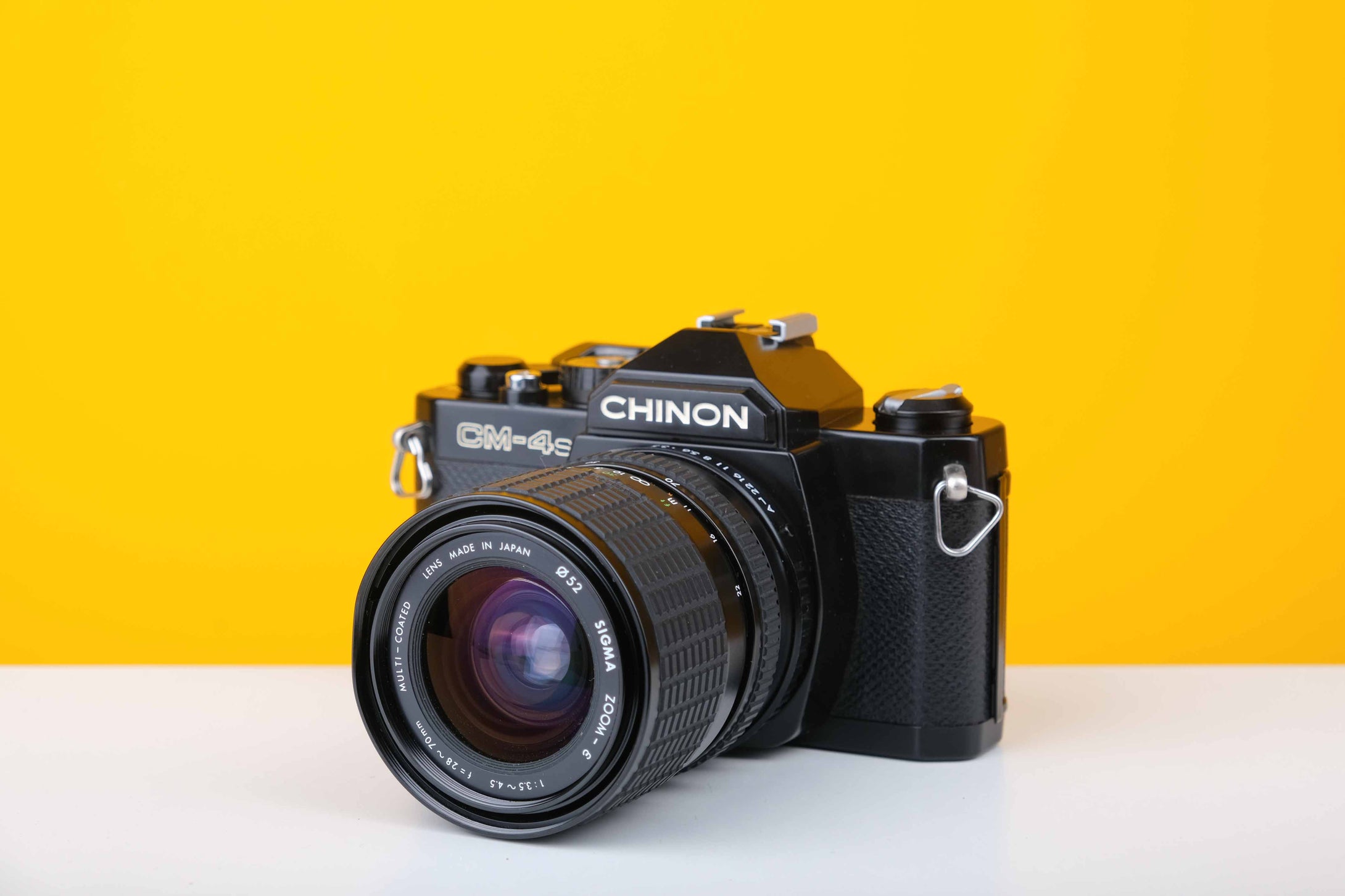 Chinon CM-4s 35mm Point and Shoot Film Camera with Sigma 28-70mm f3.5-4.5 Zoom Lens