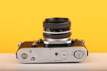 Load image into Gallery viewer, Nikon F2 35mm Film Camera with Nikon 50mm f1.8 Prime Lens
