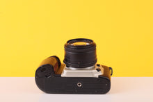 Load image into Gallery viewer, Nikon F60 35mm SLR Film Camera with Sigma 24mm f/2.8 Lens
