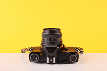 Load image into Gallery viewer, Mamiya NC1000s 35mm SLR Film Camera with Mamiya-Sekor 50mm f1.7 Lens + Mamiya 135mm Lens
