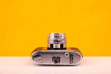 Load image into Gallery viewer, Halina Paullette Electric 35mm Camera with Halinar 45mm f2.8 Lens
