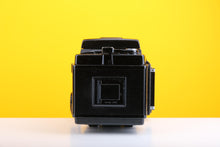 Load image into Gallery viewer, Mamiya RB67 Medium Format Film Camera with Mamiya-Sekor C 50mm f4.5 Lens and Mamiya Lens Hood plus Camera Strap

