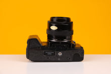 Load image into Gallery viewer, Minolta 5000 35mm Film Camera with Minolta 35-70mm f/4 Zoom Lens
