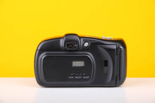 Load image into Gallery viewer, Minolta Freedom Action Zoom 35mm Point and Shoot Film Camera
